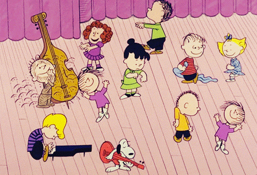 Image of Schultz's Peanuts characters dancing and playing music